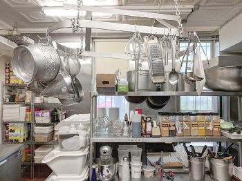 Kitchen area with pots and pans